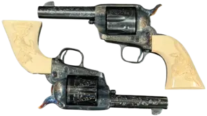 Cased pair of signed engraved Colt 3rd Generation Storekeeper Single Action Army revolvers in .45 Colt image 1