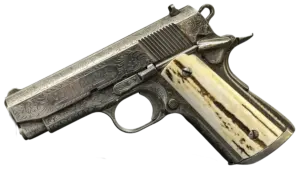 Colt Officer’s MK IV Series 80 engraved by Robert Valade with nickel finish and red stag grips image 1