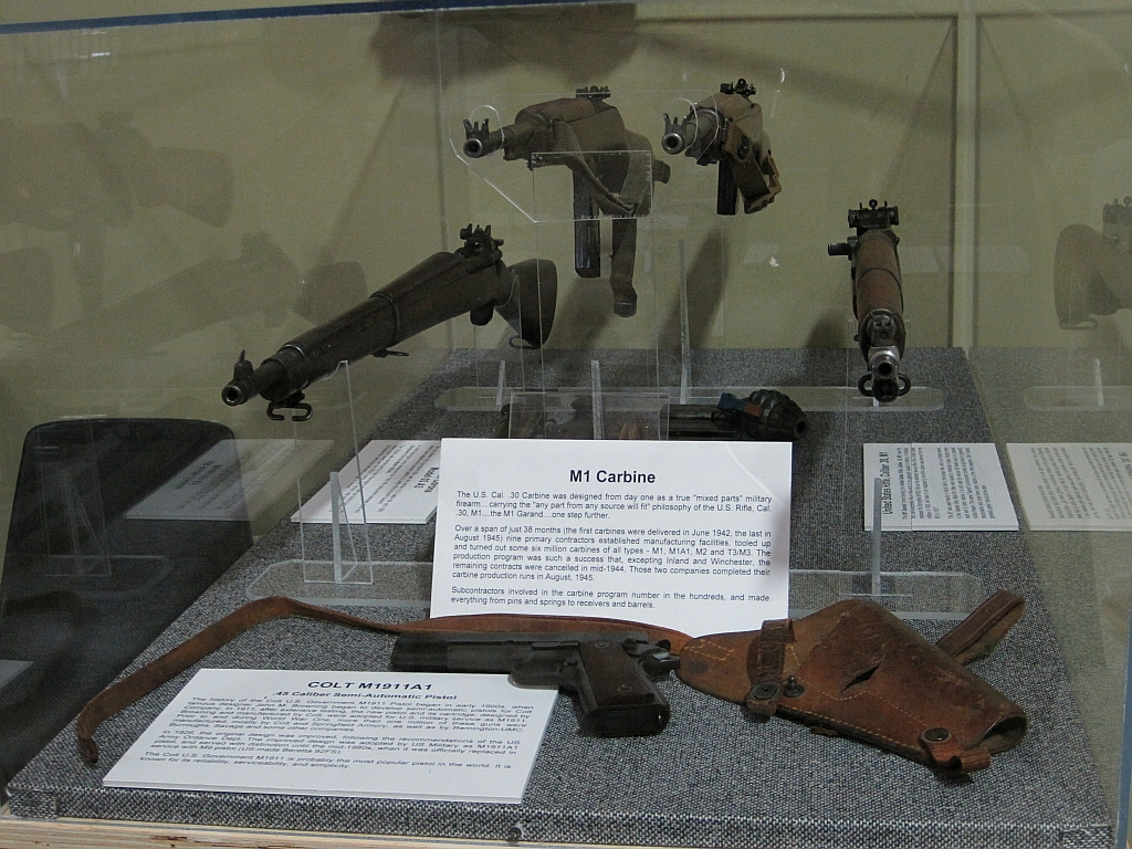 Colt M1911a1 Museum Display Case Multiple Firearms with Holster pistol shown in detail view