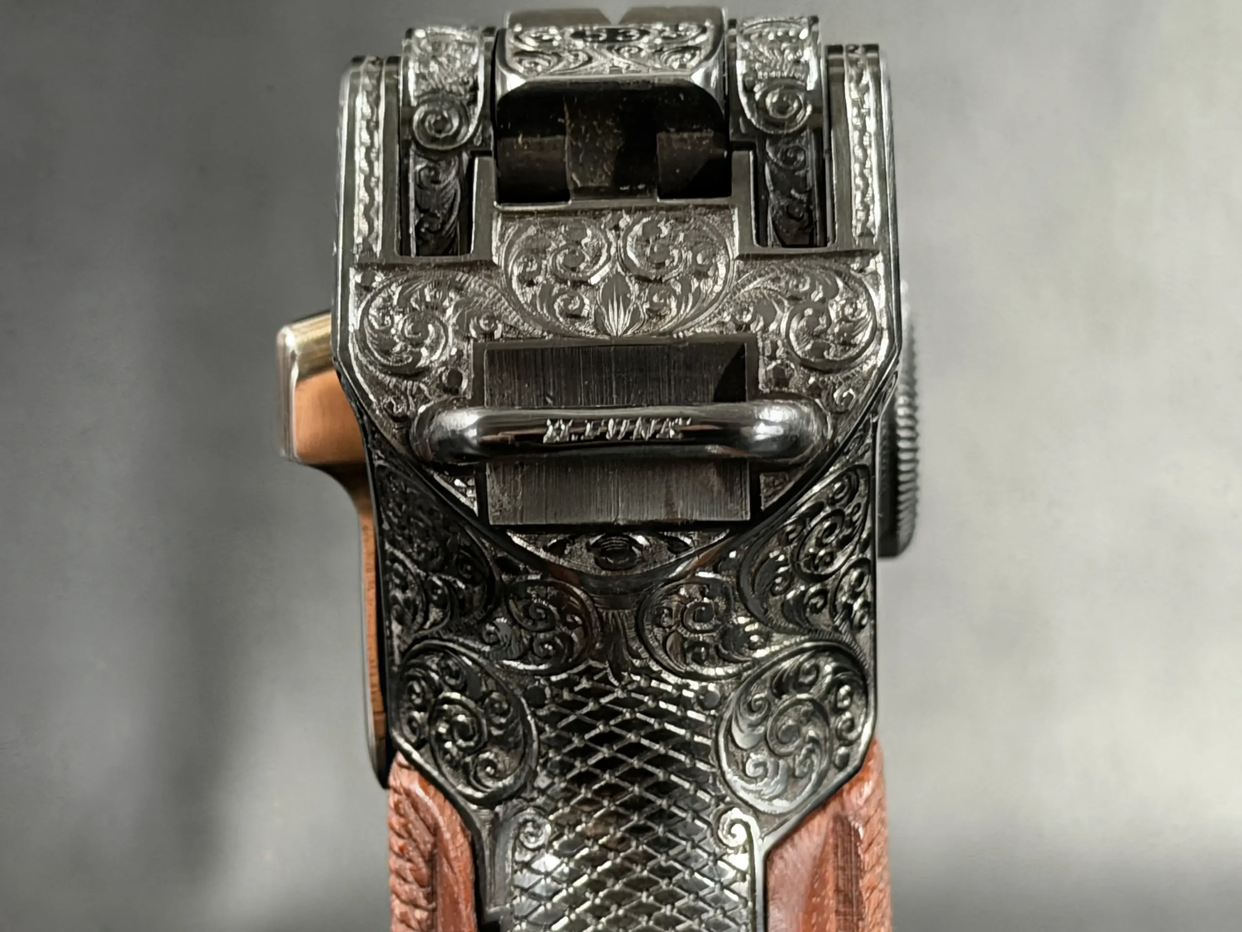 Heinz Funk Master Engraved Dwm Luger P.08 pistol shown in close-up detail