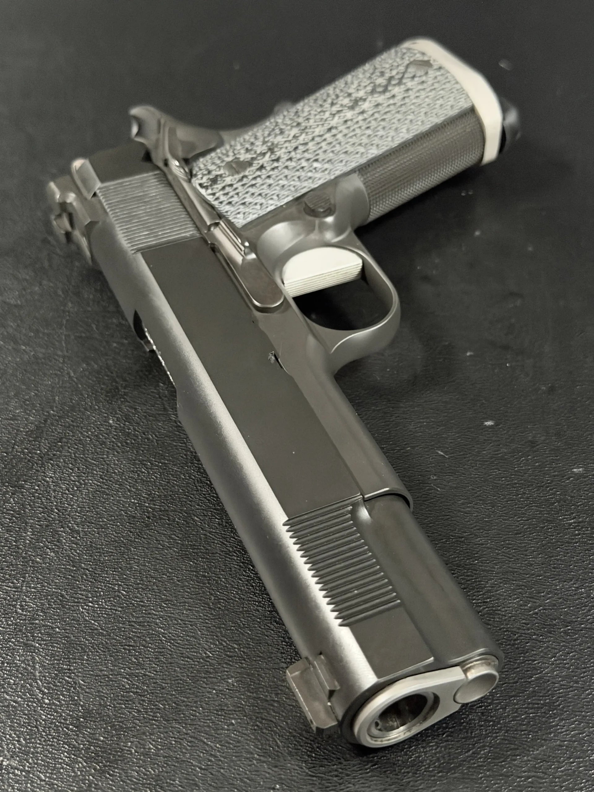 Hilton Yam Custom Evolution 1911 45 Acp pistol shown in close-up detail