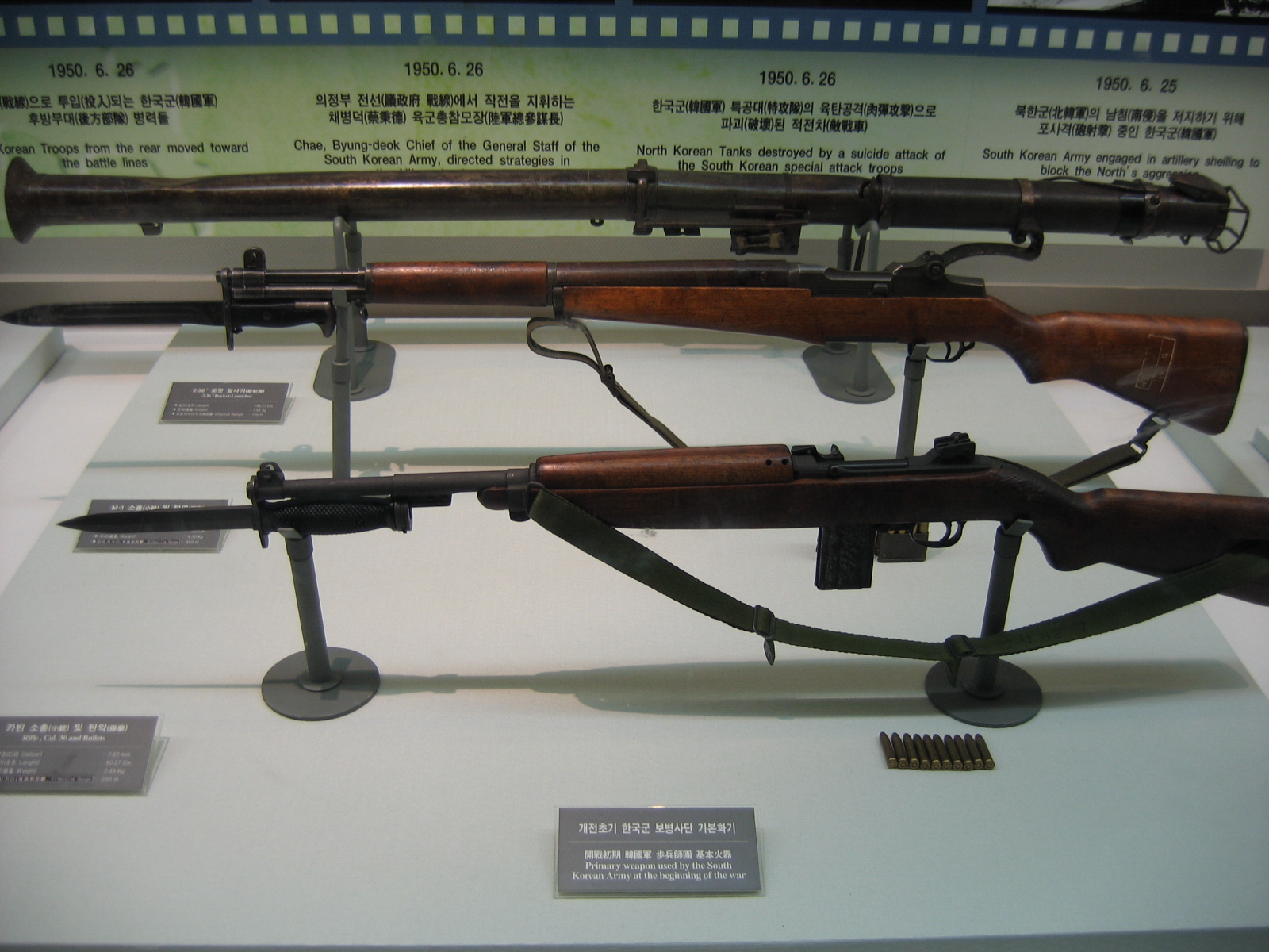 Various M1 Carbine M1 Garand M20 Bazooka Museum Display Multiple Infantry Weapons rifle shown in detail view