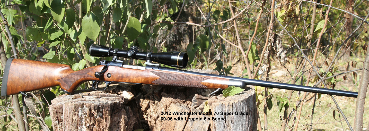 Winchester Model 70 Super Grade Right Side View with Scope rifle shown in detail view