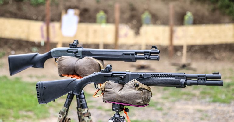 Benelli M4 Right Side View Two Shotguns On Rest shown in detail view