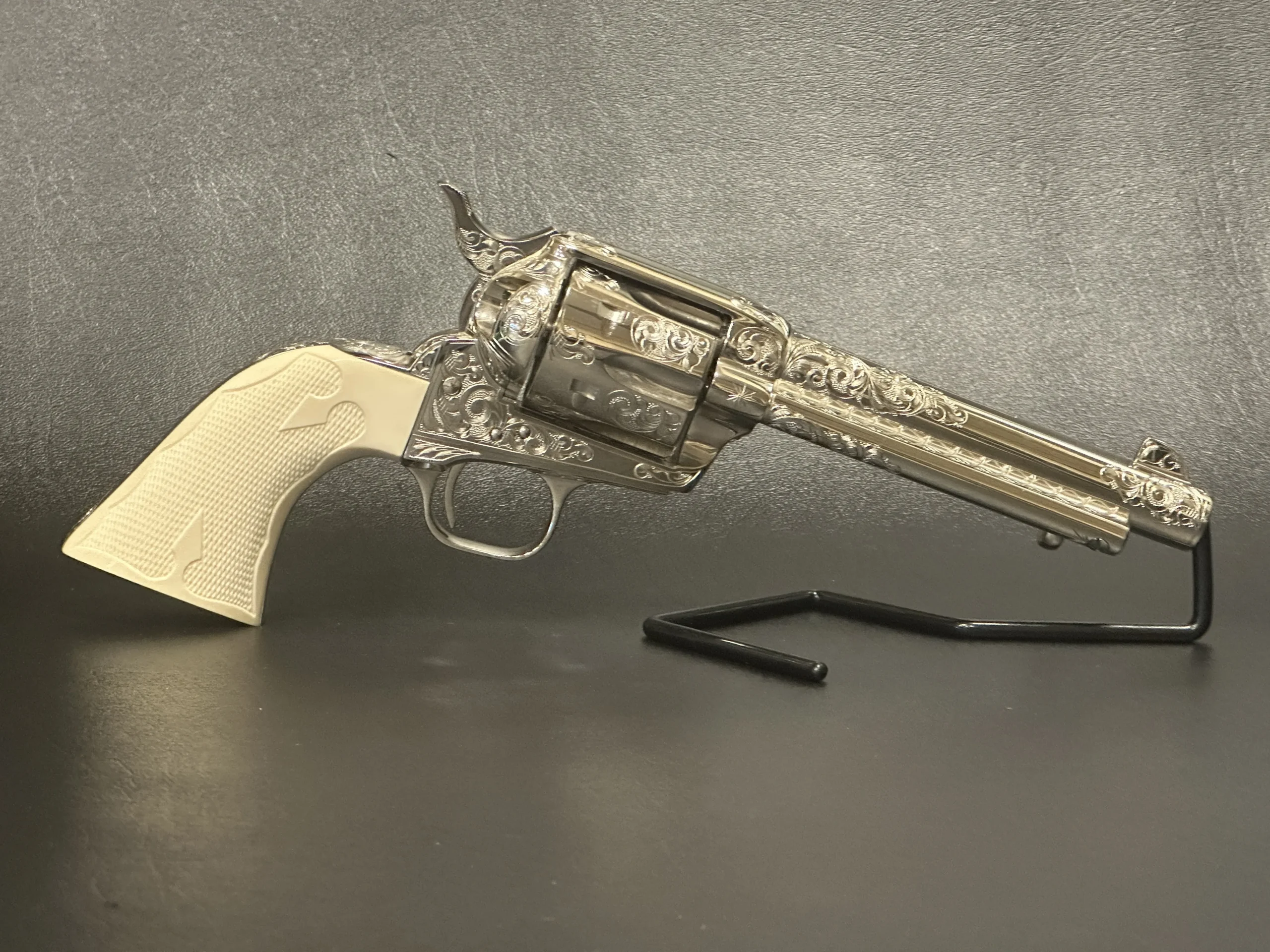 Colt 3rd Gen Single Action Army Engraved Nickel Full View 3 firearm shown in detail view