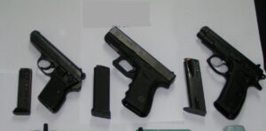 Glock 19 Three Pistols with Magazines Top Down View shown in detail view